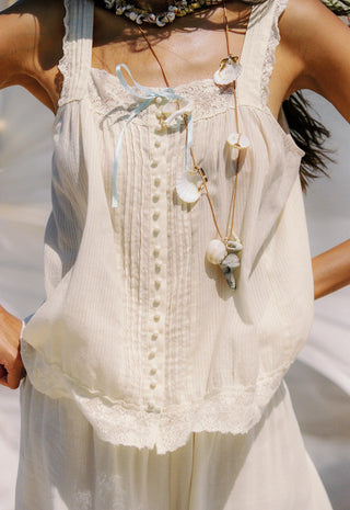  layered with a shell necklace
