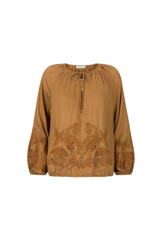 a-tan-long-sleeve-blouse-with-a-drawstring-neckline-and-intricate-embroidered-paisley-patterns-on-the-front-and-sleeves-shown-against-a-plain-white-background