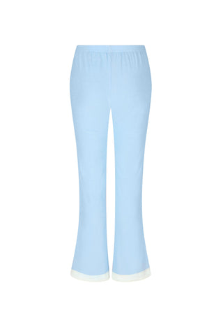 light-blue-cropped-flare-pants-with-a-white-contrast-trim-at-the-hem-shown-against-a-plain-white-background
